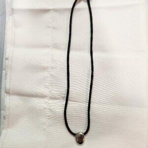 Sterling Silver Laughter charm on black leather cord